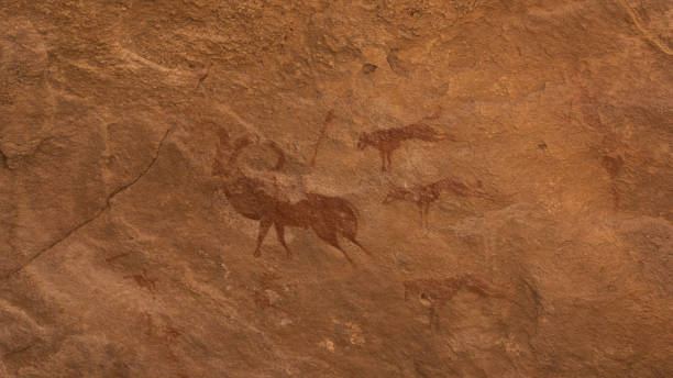 istock Ancient rock art in Sahara Desert 1200392263