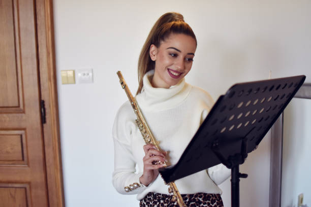 istock Woman playing flute 1200394424