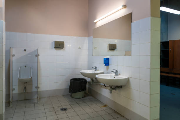 istock Sinks in a men’s locker room. 1200394571