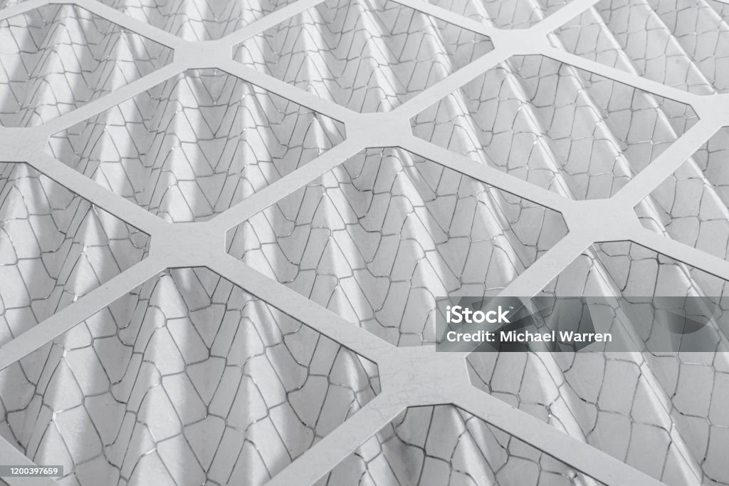 Air Conditioning Filter Pattern An air conditioning filter on a white background. Lighting Technique Stock Photo