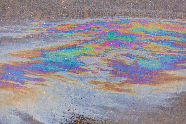 istock Gasoline stains on the pavement. 1200410415