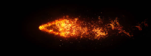 istock An abstract fire arrow that moves through the darkness at a great speed 1200412910