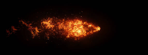 istock An abstract fire arrow that moves through the darkness at a great speed 1200412915
