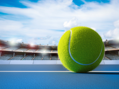 3d rendering tennis ball on blue floor with stadium background