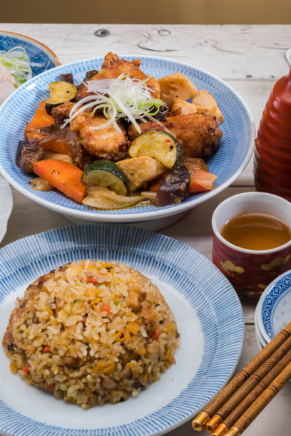 istock Sweet and sour pork and fried rice 1200434073