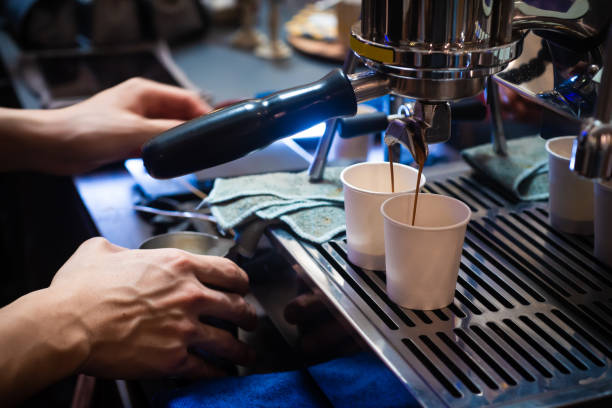 istock Espresso machine brewing a cup of hot coffee 1200443808