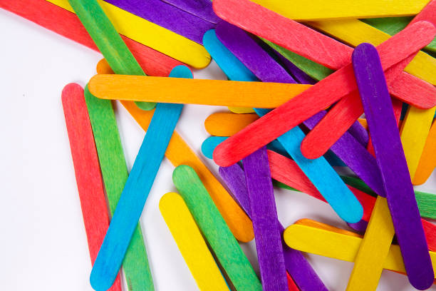 istock Colourful wooden sticks on white background 1200448149