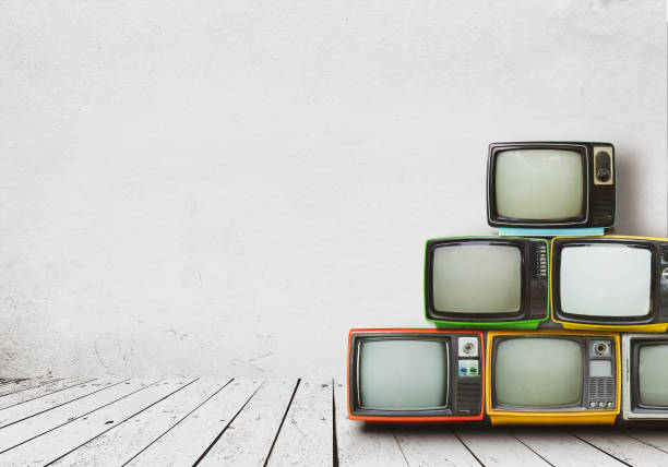 istock Retro televisions pile on floor 1200451716