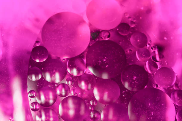 istock pink color cooking oil bubbles in water 1200452101