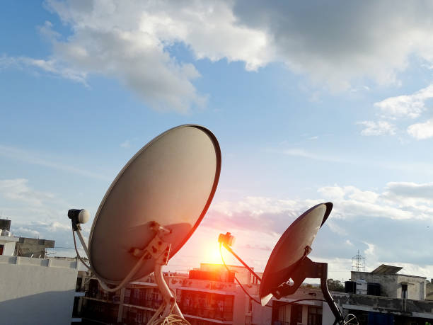 istock Home satellite dish on rooftop under the beautiful cloudscape. 1200452774