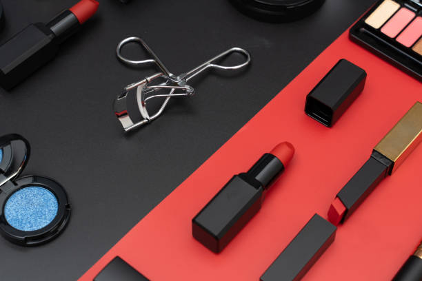 istock set decorative cosmetics on black and red background 1200463462