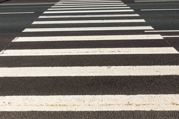istock Pedestrian road crossing 1200469179