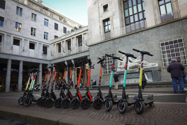 Some Elecrtic Scooter in Torino (Italy) Turin, Italy - January 18 2020: Some electric scooter parked in Torino Italy nearby plaza Castello. In Torino there are some company specialized in electric scooter (Moped) sharing. lime scooter stock pictures, royalty-free photos & images