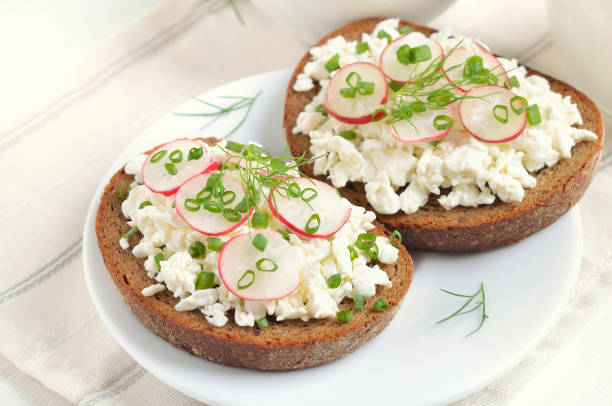 istock Bread with curd cheese, radish and green onions 1200472566