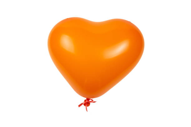 istock Orange heart ballon isolated on white background. 1200473915