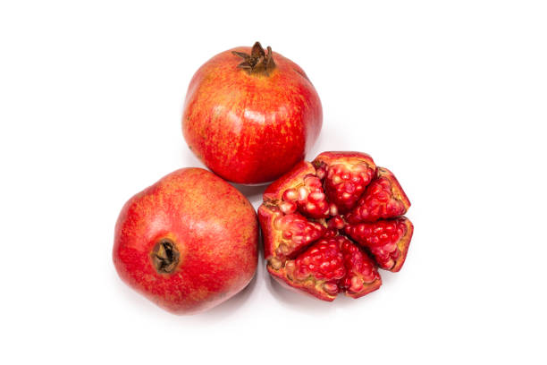 istock Sweet pomegranate isolated on white background. 1200474069