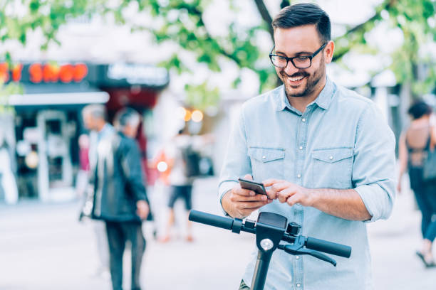istock Smart phone payment for an electric scooter 1200475237