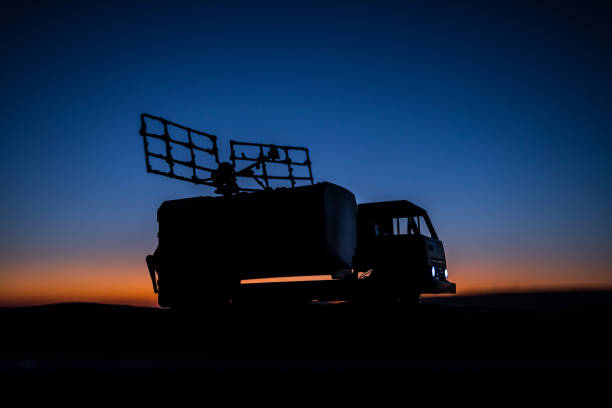 istock Satellite dishes or radio antennas against evening sky. Selective focus 1200476903