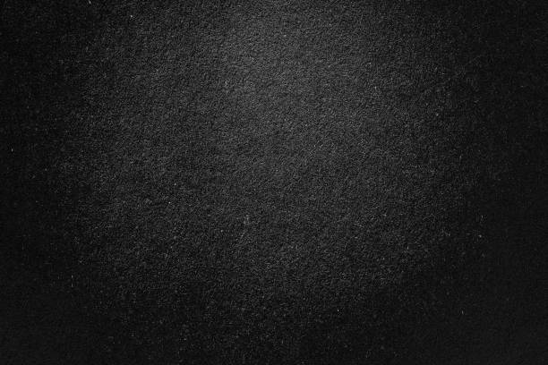 istock Clean black grungy texture roofing material close-up. rough surface. Abstract dark granular background. 1200478744