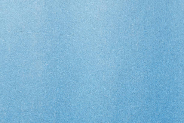 istock Blue color cardboard. Clean light blue paper texture. 1200478746