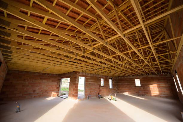 istock Residential construction home framing view on new house wooden under construction 1200479763