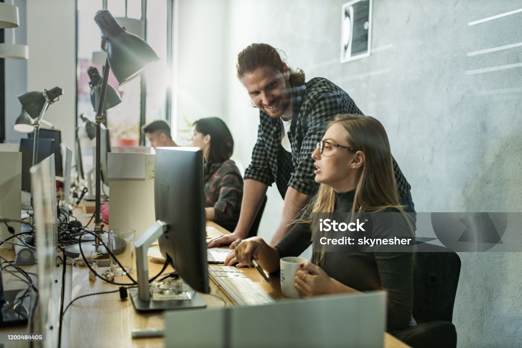 Young Programmers Young Happy Programmers Cooperating While Working On Desktop Pc In The ...