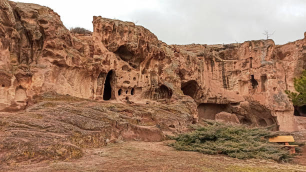 Gumusler ruins and the cave monastery in Gumusler, Nigde Ancient Gumusler ruins and the monastery surrounded by walls and caves in Gumusler, Nigde niğde city stock pictures, royalty-free photos & images