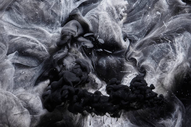 istock Abstract black and white swirling smoke background. Cumulus thunderclouds, mysterious and frightening sky. Paints colors of depression and negative emotions 1200492374