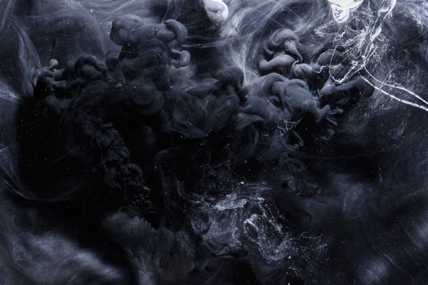 istock Abstract black and white swirling smoke background. Cumulus thunderclouds, mysterious and frightening sky. Paints colors of depression and negative emotions 1200492480