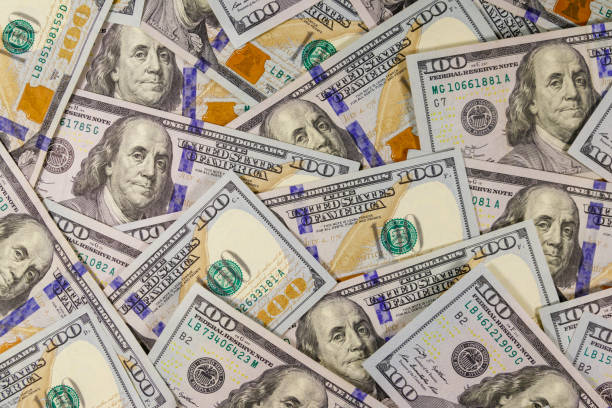 istock Background of american one hundred dollar bills 1200493196