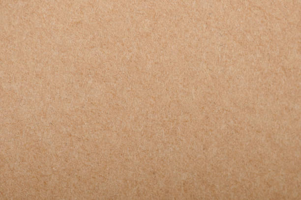 Flat brown color carton background Flat brown color carton background. Texture of rough recycled paper brown university stock pictures, royalty-free photos & images