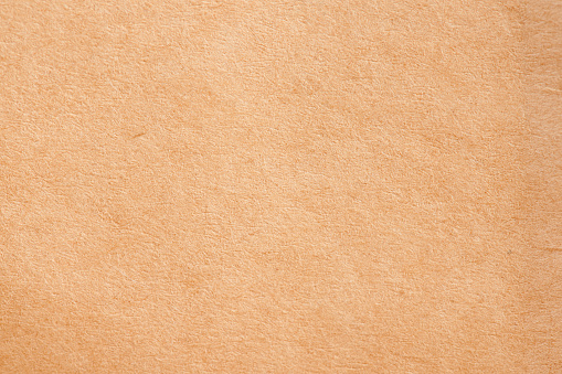 Mat brown paper background macro close up view