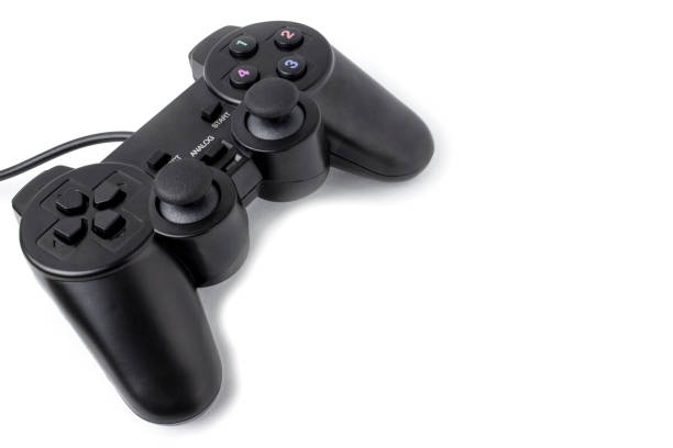 istock Joystick for playing top view isolated on white background with place for text. Black remote control for video games 1200497244