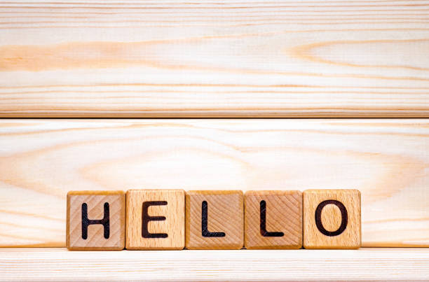 istock Hello word concept. The word Hello on wooden cubes. Hello background. Hello invitation. Hello background. Greeting hello. Wooden background. Meeting, salutation, salute, welcome concept 1200498301