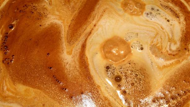 istock experiment photo with cappuccino foam and milk and coffee 1200500562