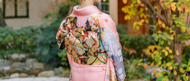 istock Young woman wearing a kimono 1200501646
