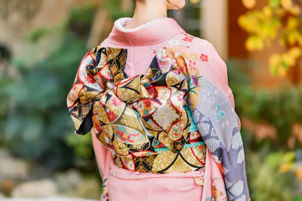 Young woman wearing a kimono