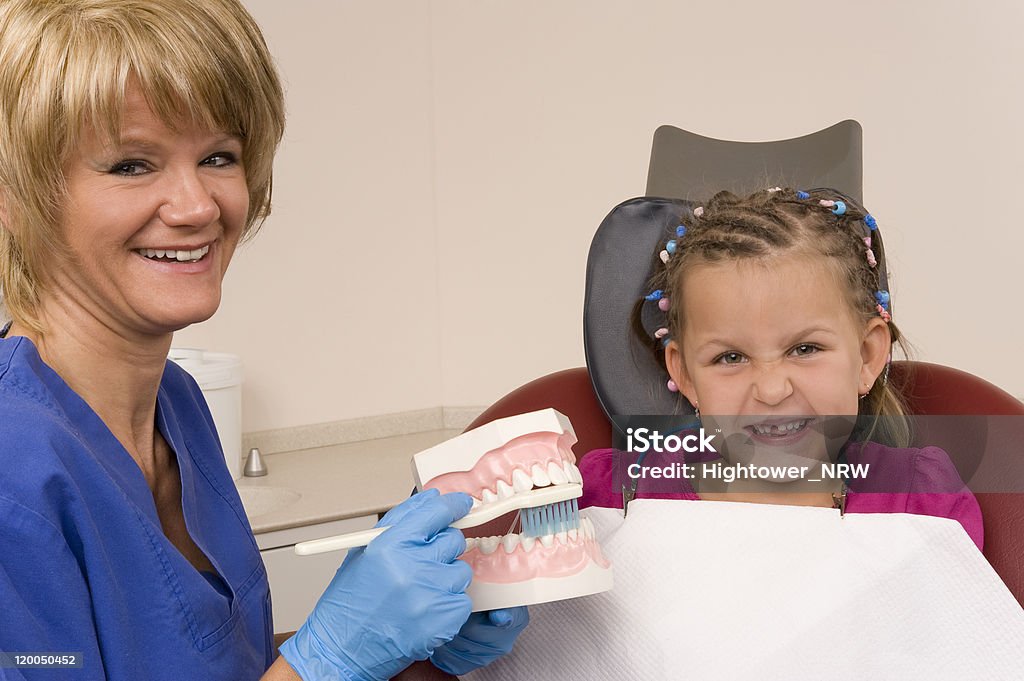 Dentist A child and the dentist Adult Stock Photo