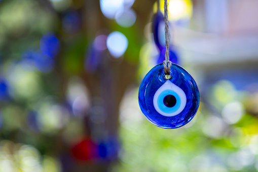 Turkish blue eye. Traditional Turkish national decoration and amulet for good luck and protection. Blue glass eye is used in interior decorations. High quality photo