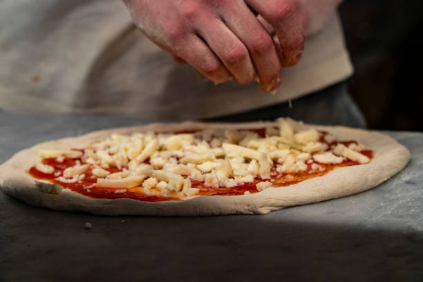 istock italian tomato and mozzarella pizza ready to cook 1200508687