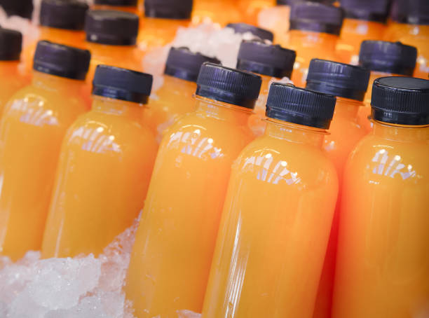 istock Fresh carrot juice or orange juice, packed in a ready-to-drink. 1200512616