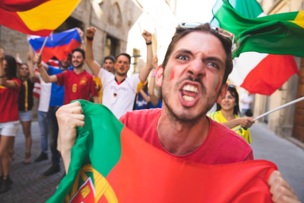 istock Soccer fans celebrating success 1200513909