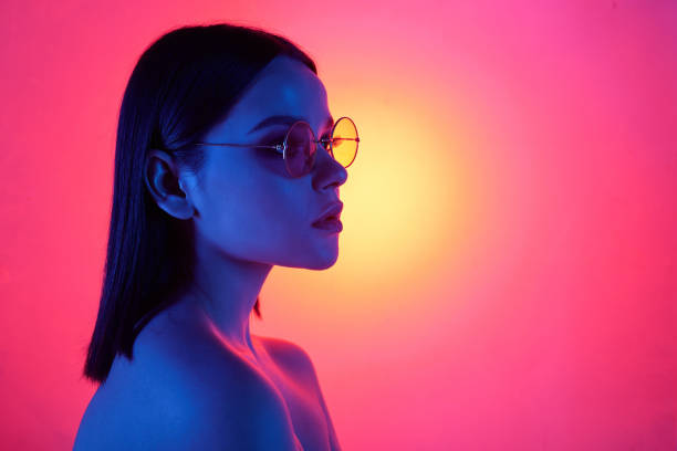 istock Naked girl against bright pink background 1200513968