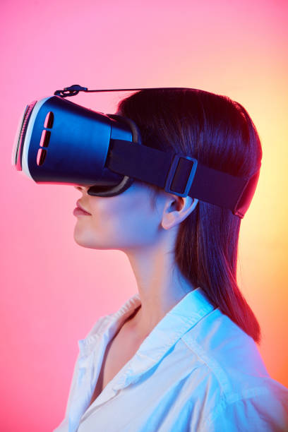istock Girl in virtual reality goggles 1200514017