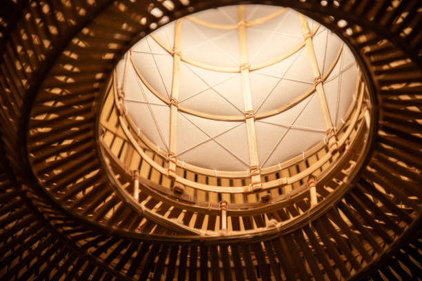 istock weaving bamboo lantern. handmade hanging lamp background and texture in night time. asian traditional Straw woven lantern. 1200521522
