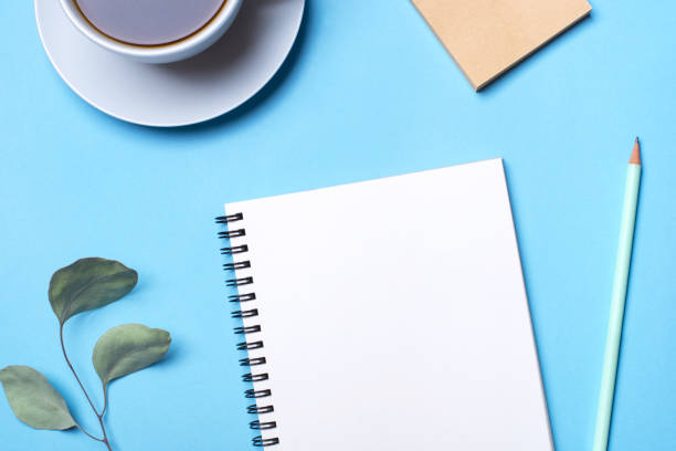 istock Flat lay photo of a freelancer workspace desk with copy space background. 1200523568