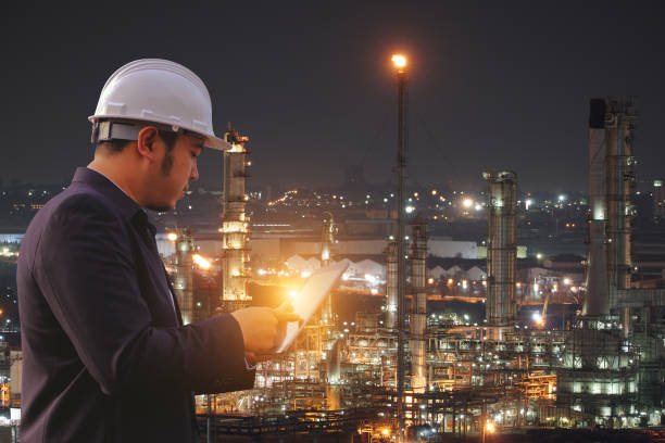 istock Petrochemical industry in the night time. 1200525330