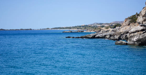 istock the rocks on the blue sea 1200526374