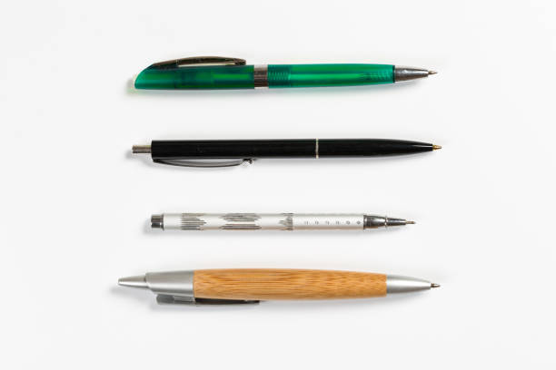 istock Collection of multi-colored ballpoint pens isolated on a white 1200528351