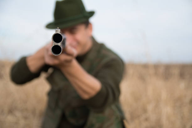 istock Close Up of a riffle pipe with hunter holding it 1200531018